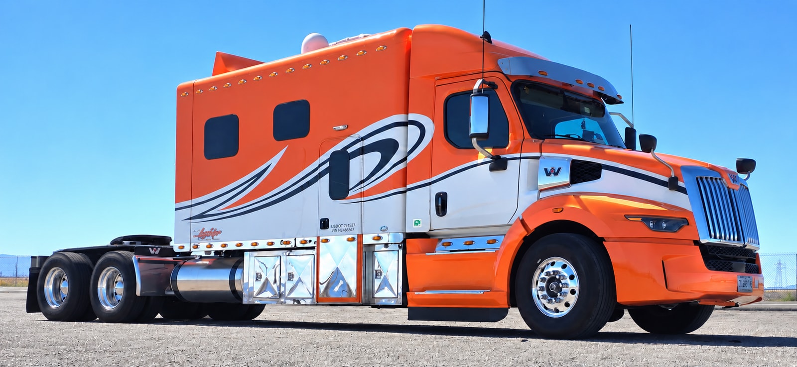David Nichols's orange and white Western Star truck with a custom sleeper