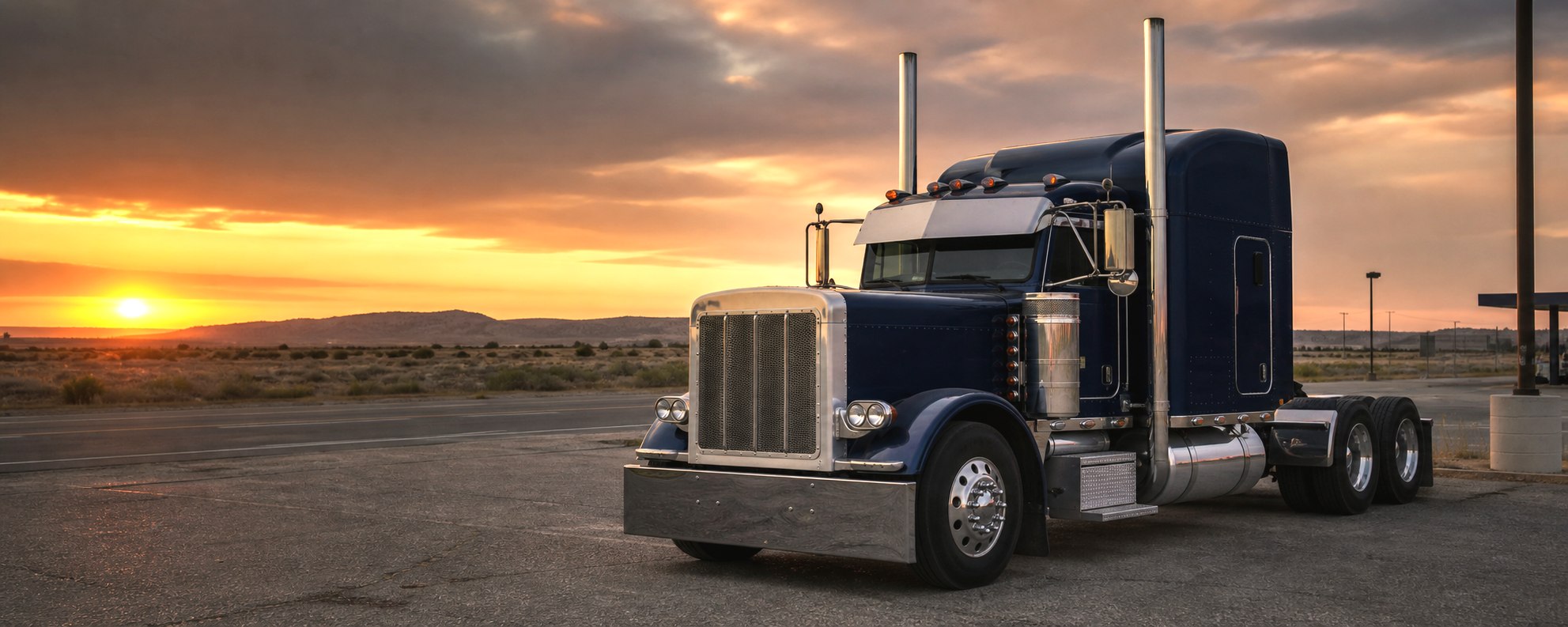 Classic American semi truck at dusk